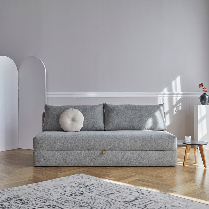 Armless Ash Grey Nest Storage Sofa bed in grey room