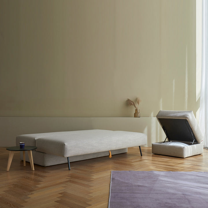 Nest storage sofa bed open to bed. Paired with the Nest storage ottoman open to show storage